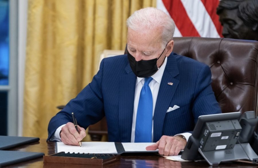 President Biden signing an executive order