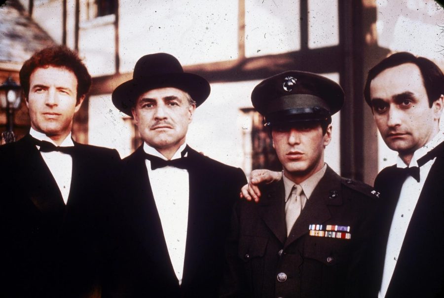 1972:  Left to right: American actors James Caan, Marlon Brando, Al Pacino and John Cazale (1936 - 1978) pose together outdoors in a still from director Francis Ford Coppolas film, The Godfather,  based on the novel by Mario Puzo.  (Photo by Paramount Pictures/Fotos International/Getty Images)