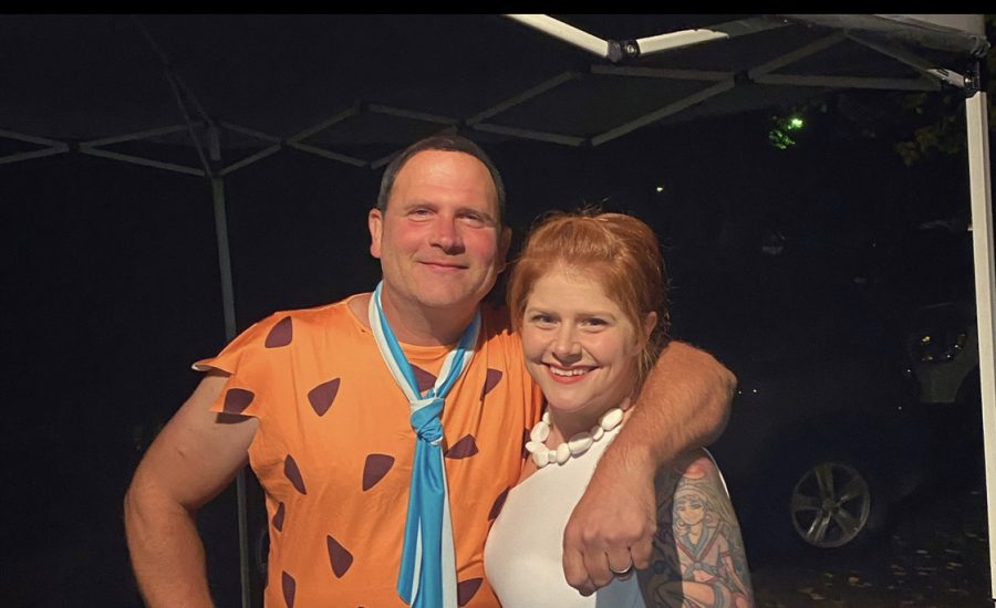 Mrs. Burton and her husband dressed as Fred & Wilma Flinstone on Halloween.