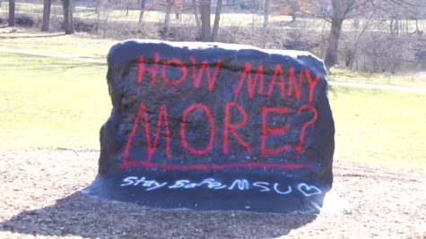The Rock at Michigan State University painted in response to the shooting.