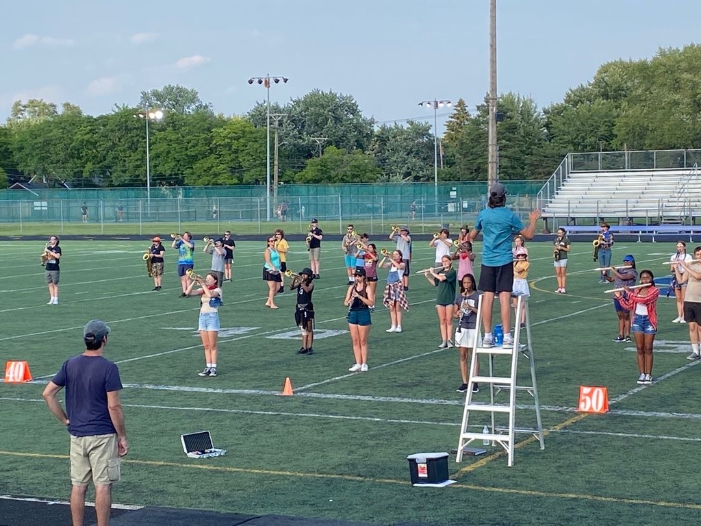 The marching band practices at band camp