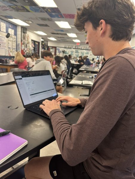 Evan Haenick working on an assignment for his online class, Mathematics of Baseball. 