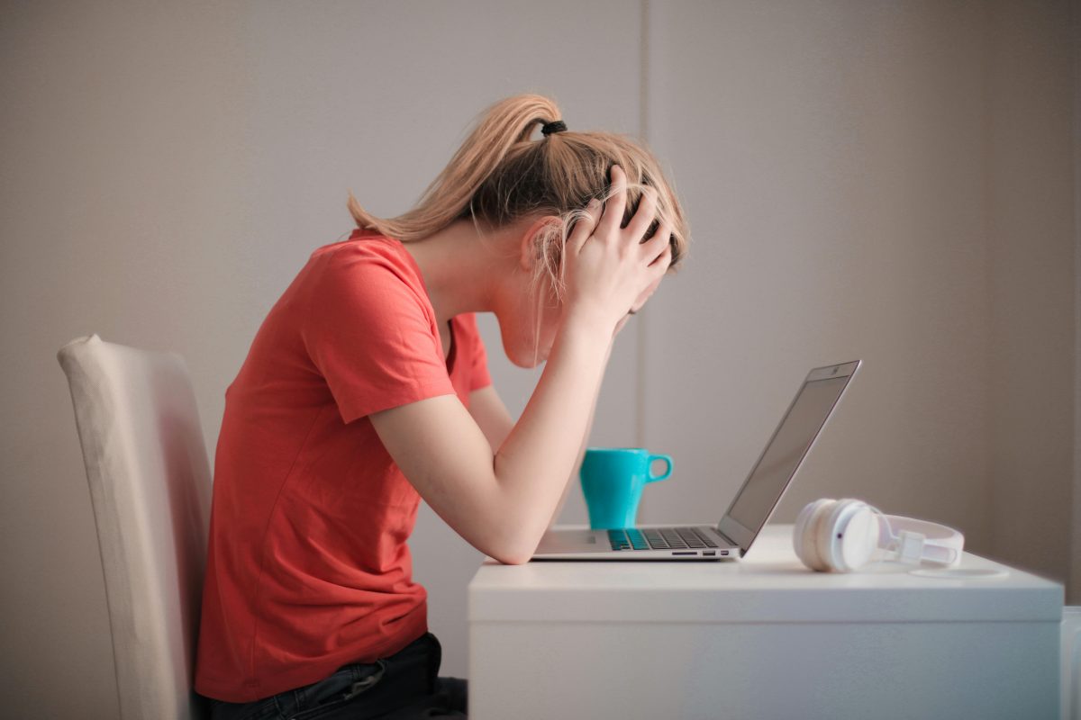 Girl is stressed over her work.