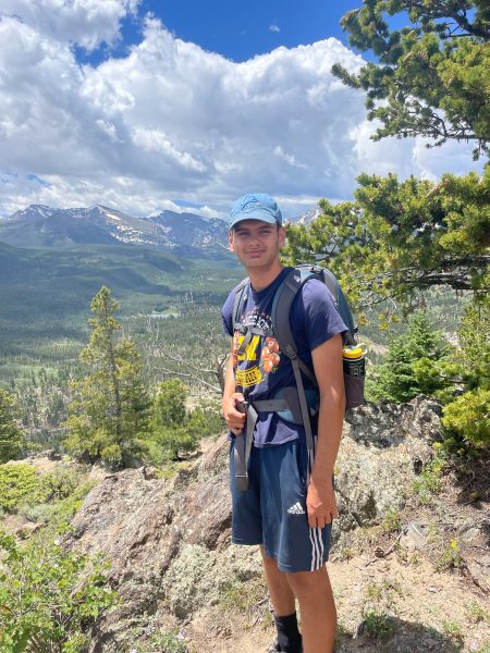 Josh Bhagwan hiking in the Rocky Mountains in Colorado.