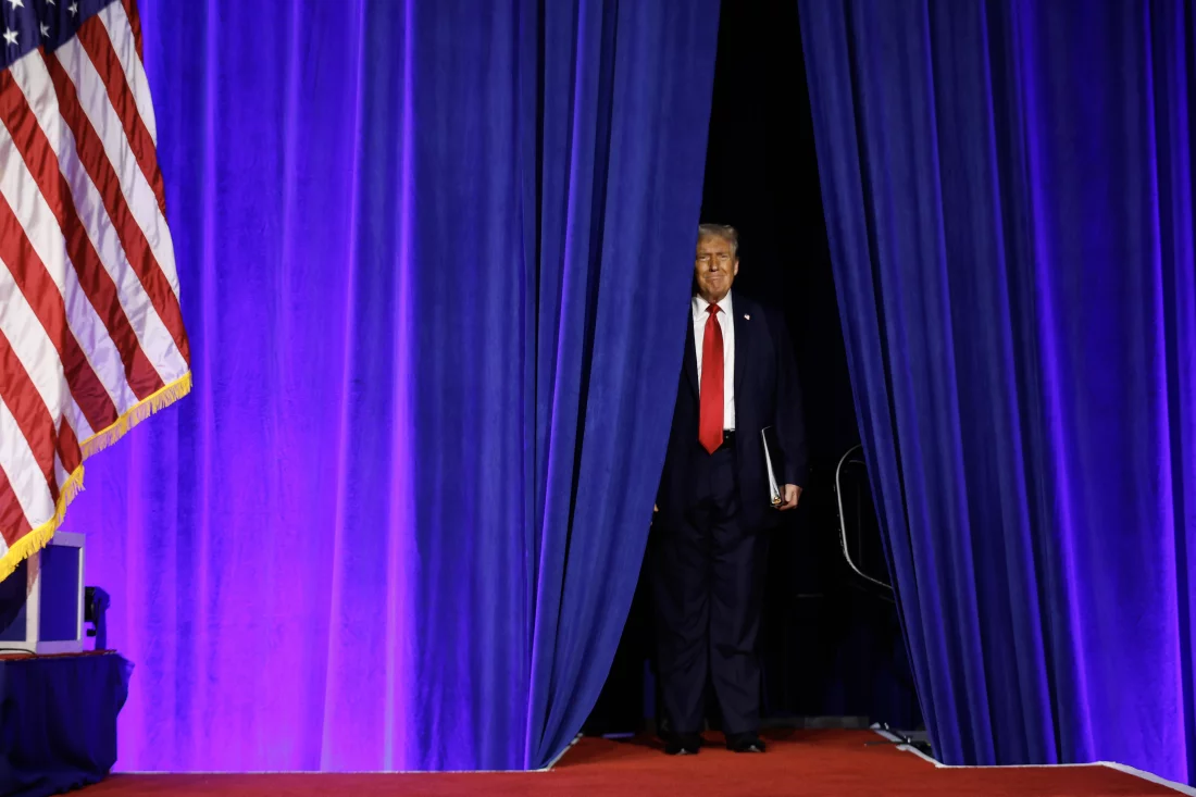 Trump waiting to take the stage to speak on election night. 