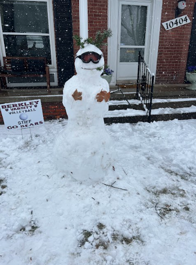 Finished snow man built on a snow day 