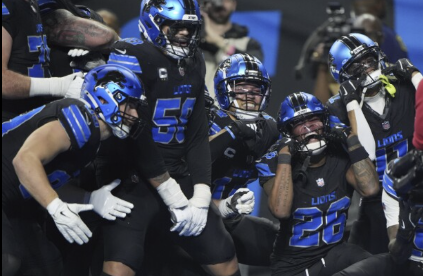 Detroit Lions celebrate their 31-9 win over the Vikings