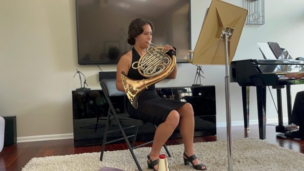 Rebekah Kim playing French Horn