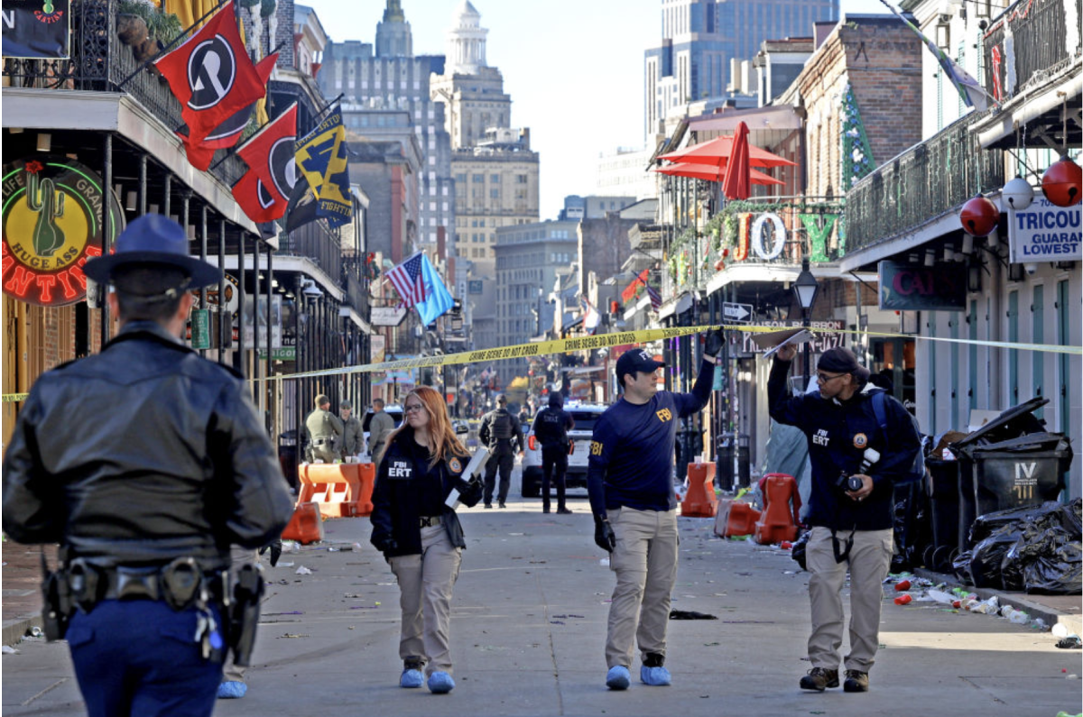 Law enforcement officers from multiple agencies work the scene on Bourbon Street after at least 10 people were killed when a person reportedly drove into the crowd in the early morning hours of New Year’s Day on Jan. 1, 2025,