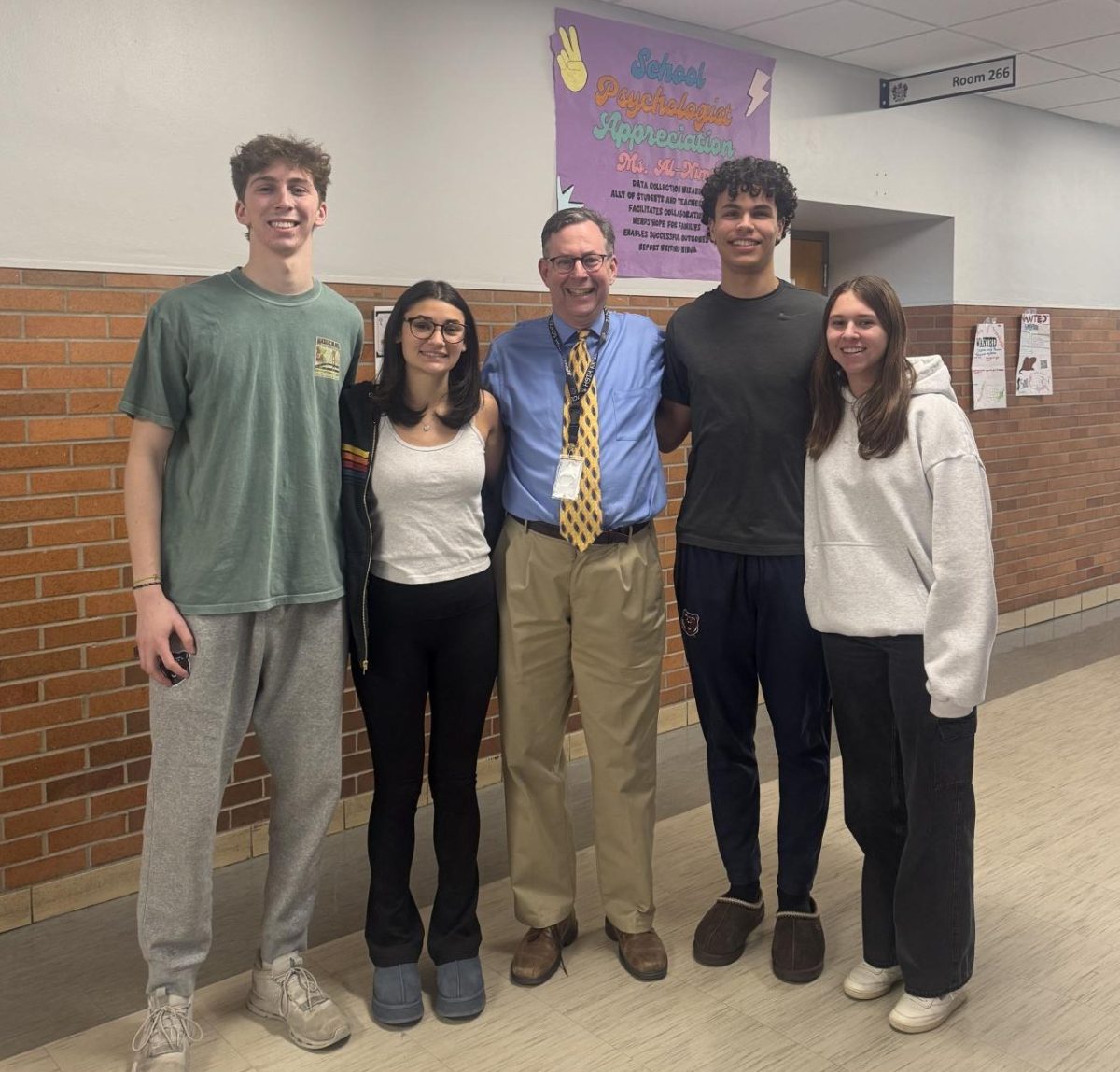 Mr. Weingarden with the four contestants!