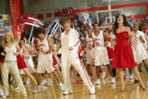 Students from the movie High School Musical dancing in the gym after a basketball game. Photo from people.com.