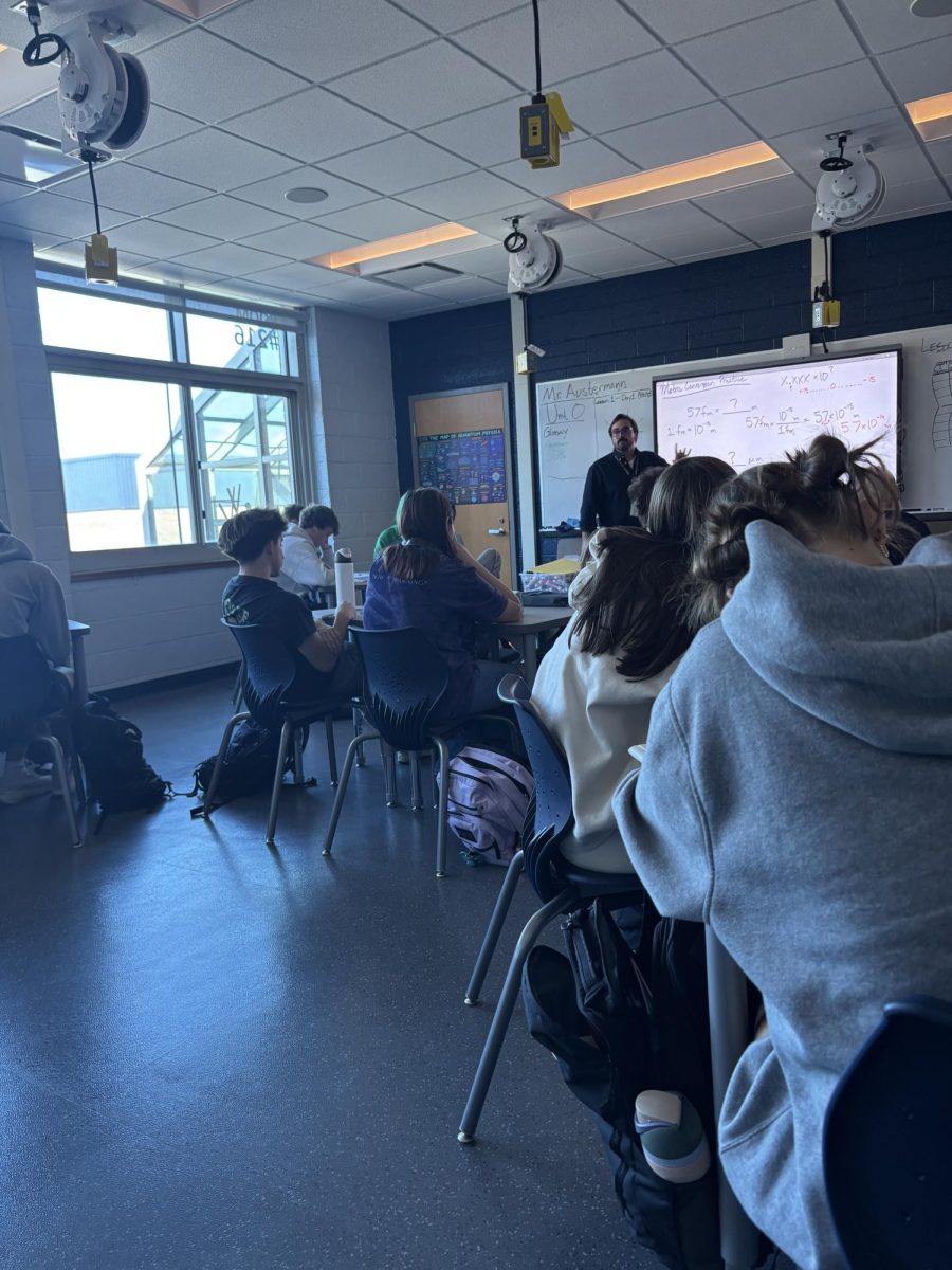 Mr. Austermann preparing the Physics of The Universe class for the upcoming quiz on Tuesday.