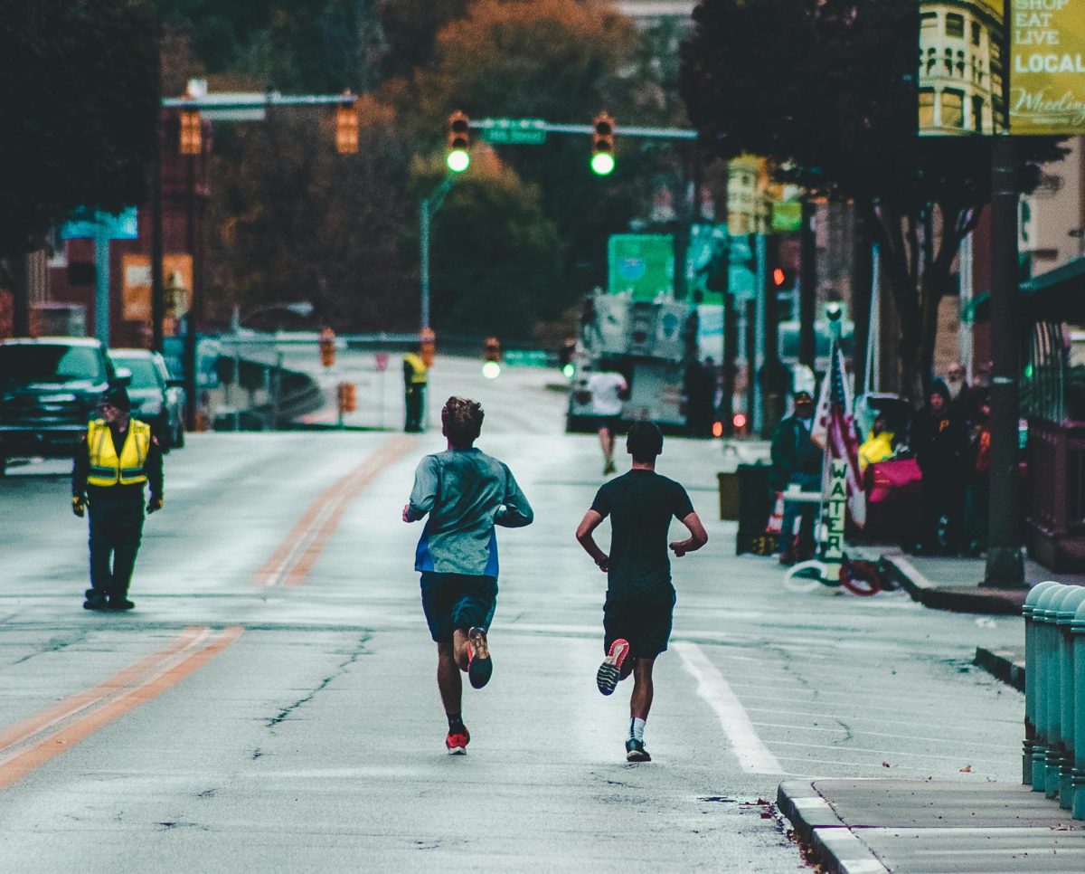 Photo by Rosemary Ketchum: https://www.pexels.com/photo/two-men-running-on-concrete-road-1564470/