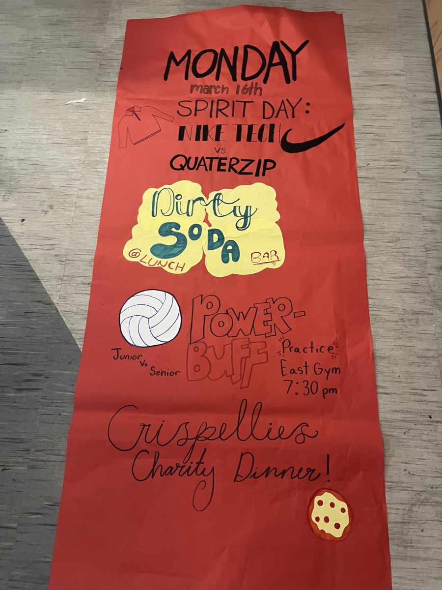 The banner that Student Leadership made for Charity Week to show all the events on Monday, March 16.