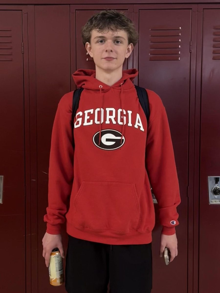 Junior Mikey Slago-Overton wearing a University of Georgia sweatshirt. 